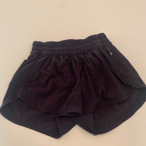 Dark purple lululemon hotty hot shorts 4”
